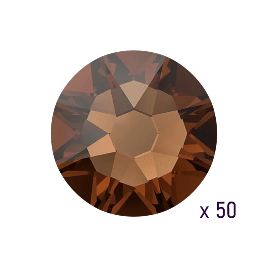 Swarovski ReCreated™ Smoked Topaz Tooth gems